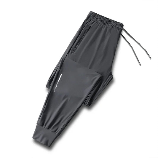 Men's solid color pants summer ice silk elastic quick drying/loose sports pants suitable for casual and business wear M-8XL