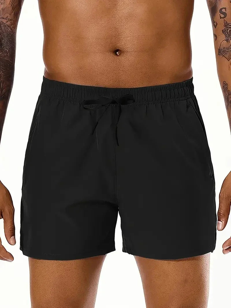 Men New Summer Beach New Models Solid Color Fashion/Leisure Comfortable Elastic Waist Double Pockets Cool Sports Shorts