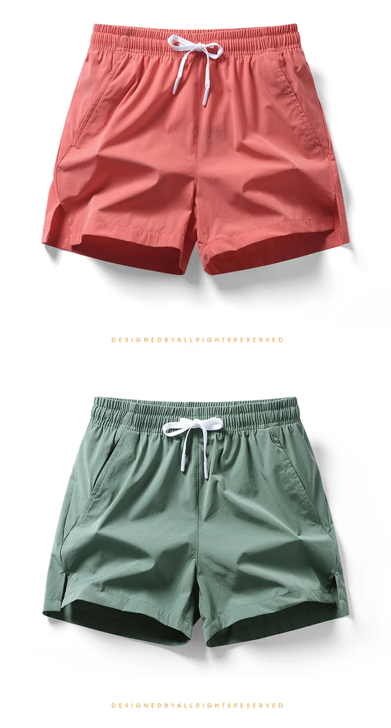 Men New Summer Beach New Models Solid Color Fashion/Leisure Comfortable Elastic Waist Double Pockets Cool Sports Shorts