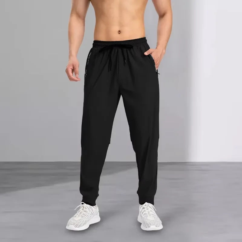 Ice silk pants men's quick drying elastic trend/casual pants ultra-thin ice sports pants
