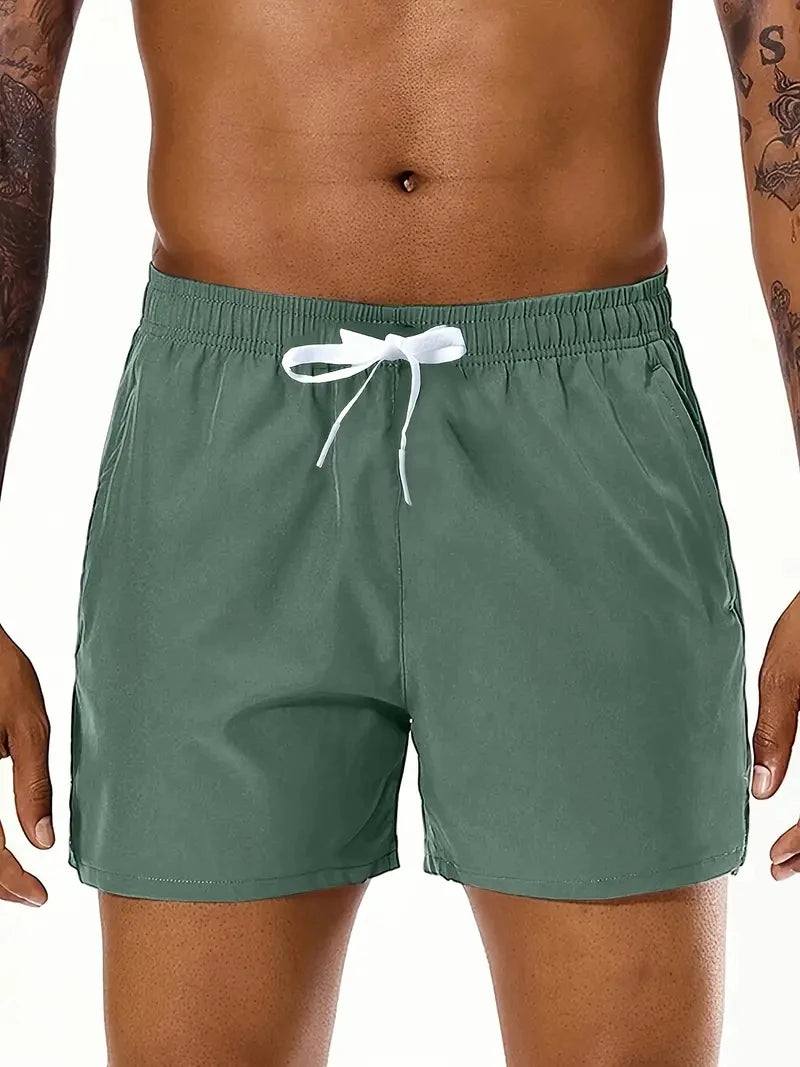 Men New Summer Beach New Models Solid Color Fashion/Leisure Comfortable Elastic Waist Double Pockets Cool Sports Shorts