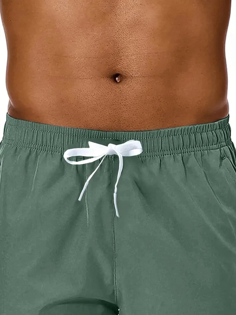 Men New Summer Beach New Models Solid Color Fashion/Leisure Comfortable Elastic Waist Double Pockets Cool Sports Shorts