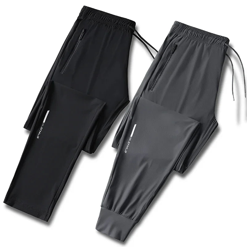 Men's solid color pants summer ice silk elastic quick drying/loose sports pants suitable for casual and business wear M-8XL