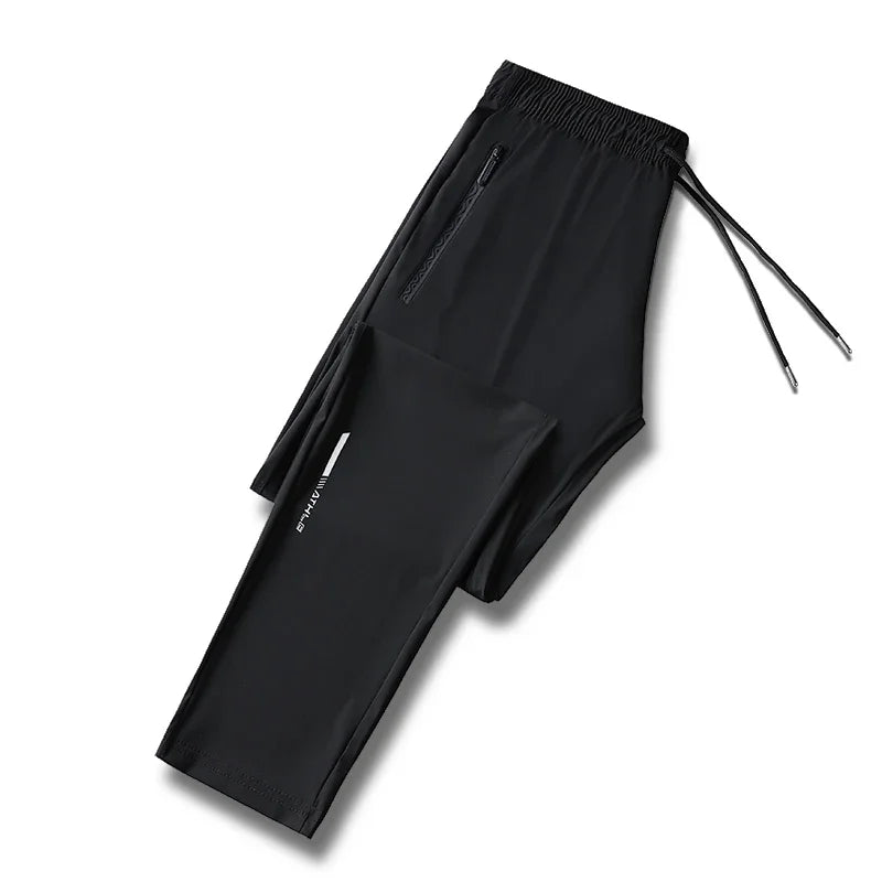 Men's solid color pants summer ice silk elastic quick drying/loose sports pants suitable for casual and business wear M-8XL