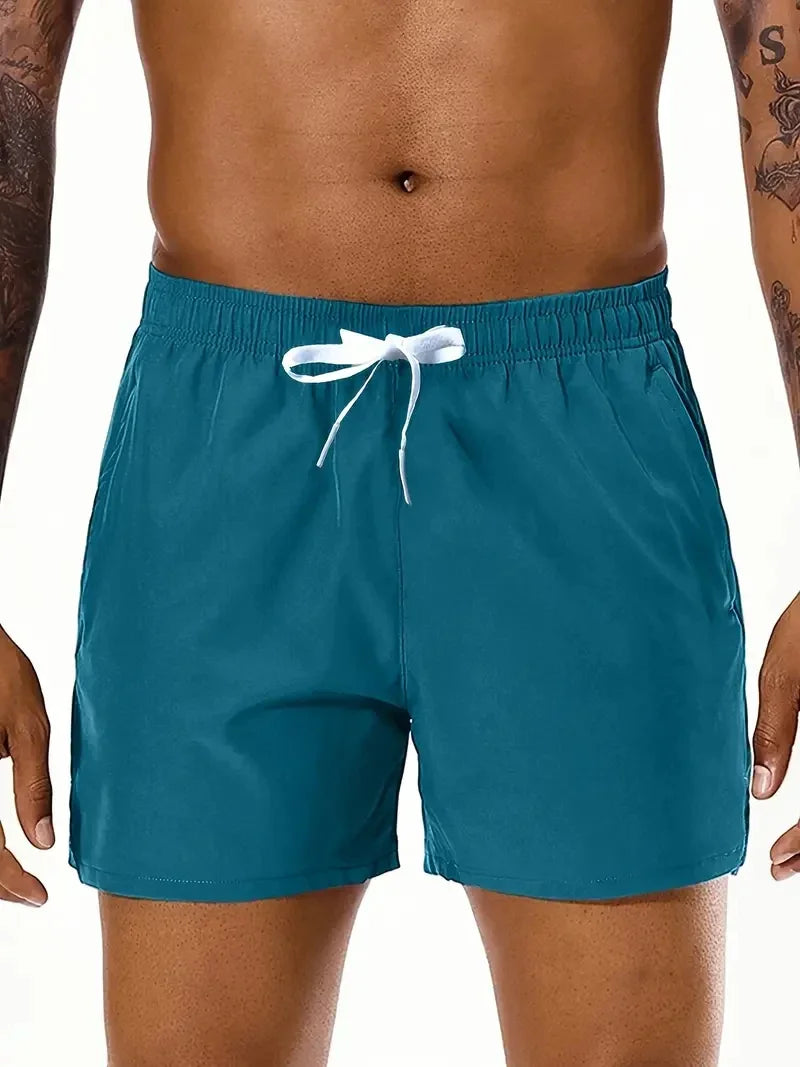 Men New Summer Beach New Models Solid Color Fashion/Leisure Comfortable Elastic Waist Double Pockets Cool Sports Shorts