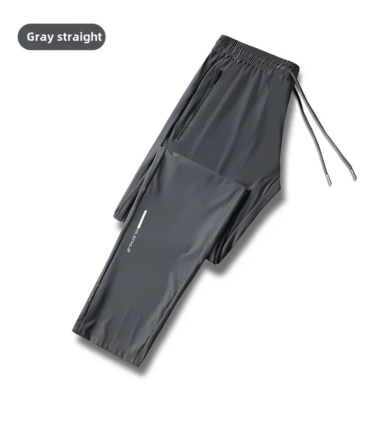 Men's solid color pants summer ice silk elastic quick drying/loose sports pants suitable for casual and business wear M-8XL