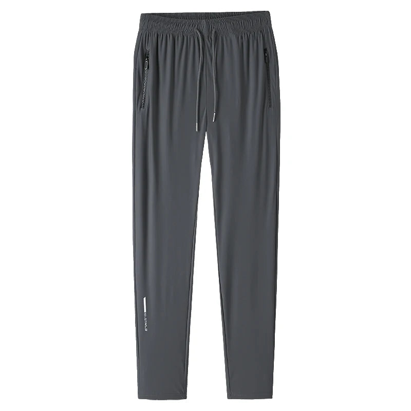 Men's solid color pants summer ice silk elastic quick drying/loose sports pants suitable for casual and business wear M-8XL